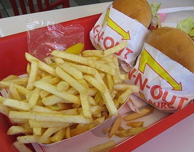 Tray with two In-N-Out burgers and fries.