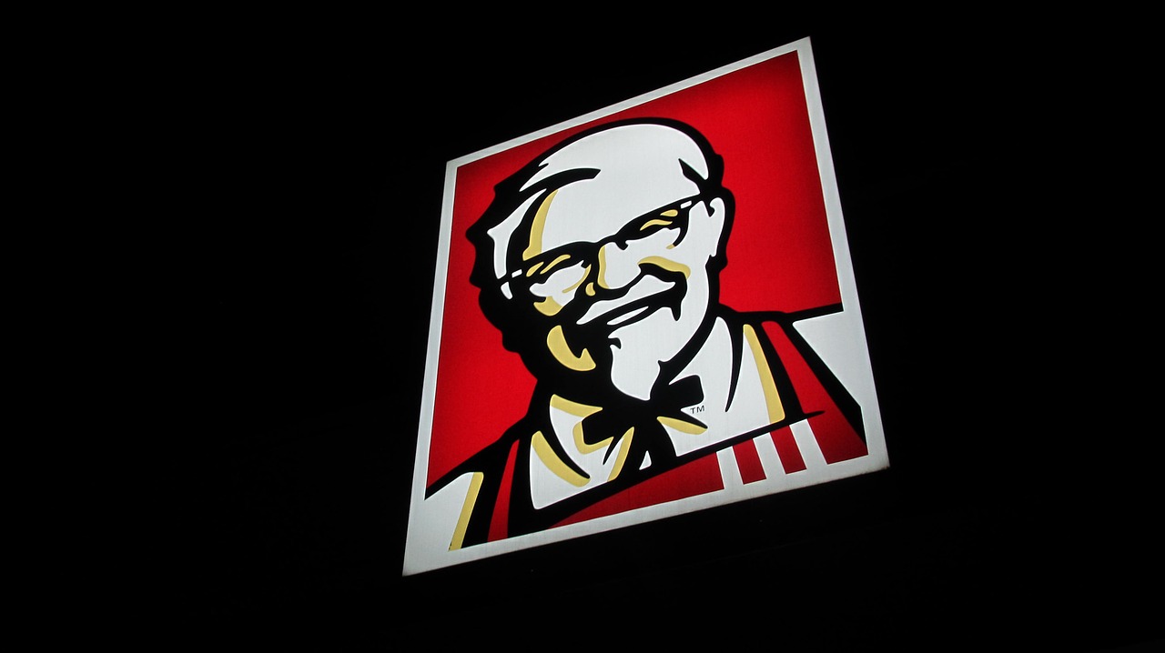 Image of Colonel Sanders (KFC sign at night)