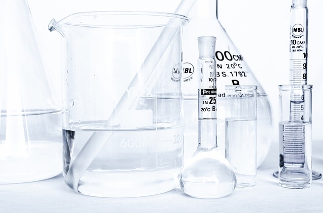 Clear test tubes and beakers with clear solutions.