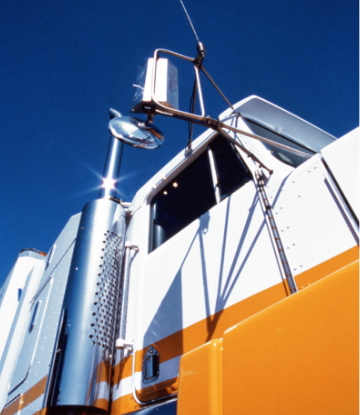 Supply Chain Scene, image of a truck against a blue sky 