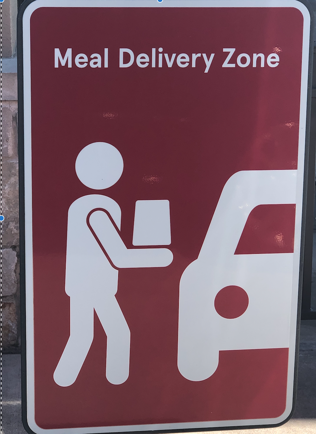 Supply Chain Scene, image of a Meal Delivery Zone sign 