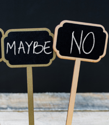 Supply Chain Scene, image of a "maybe" sign and a "no" sign in chalk 