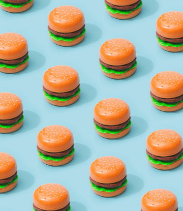 Supply Chain Scene, image of a group of miniature, plastic burgers 