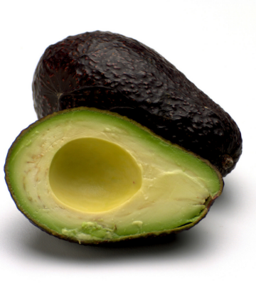 Supply Chain Scene, image of a cut open avocado on its side 