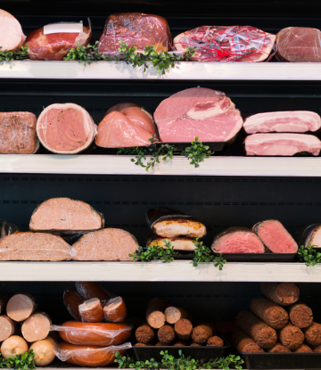 Supply Chain Scene, image of 4 store shelves full of various meat products 