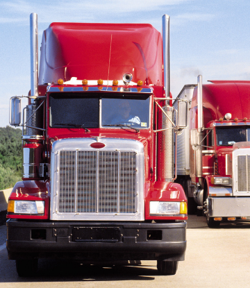 Supply Chain Scene, image of two large trucks 