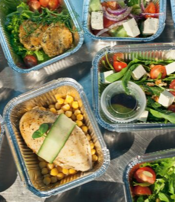 Supply Chain Scene, image of several take out meals in trays 