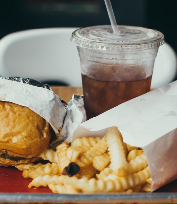 Supply Chain Scene, image of burger, fries, drink as takeout meal 
