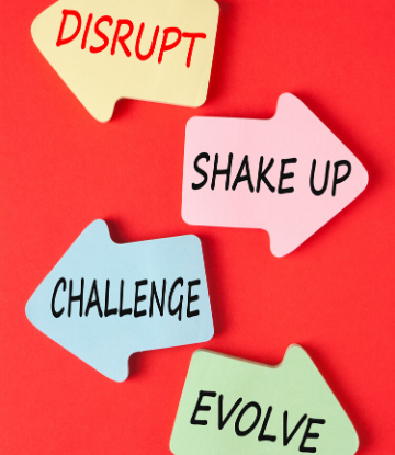SCS, image of the words disrupt, shake up, challenge, and evolve on a red board 