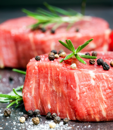 SCS, image of real raw steaks with seasoning on top 