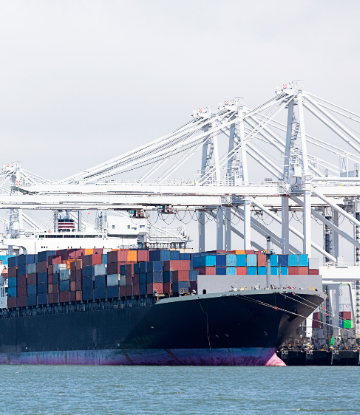 Image of a large container ship at port 