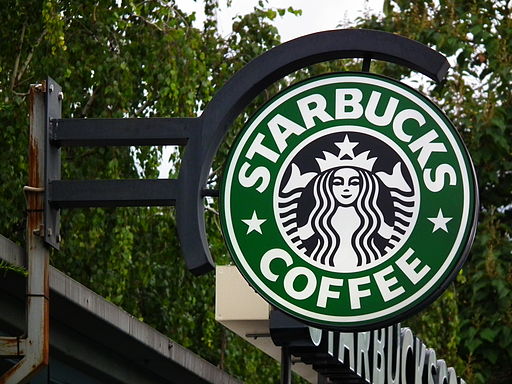Starbucks Coffee sign outside of a restaurant