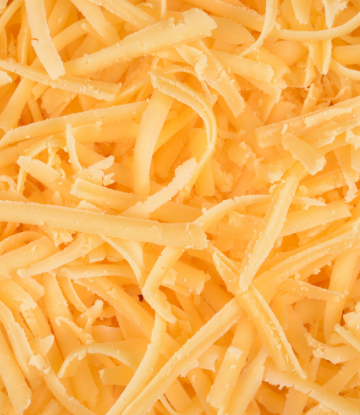 closeup of shredded yellow cheese 