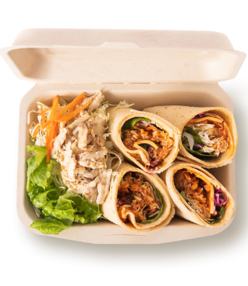 Image of food in a clam shell to-go package 