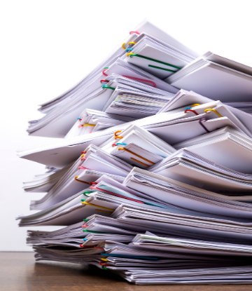 Image of a tall stack of paperwork 