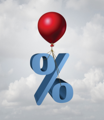 red balloon rising with a percentage symbol