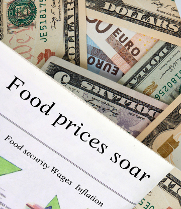 money with the words FOOD PRICES SOAR
