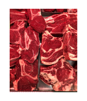 Assortment of fresh cuts of red meat 