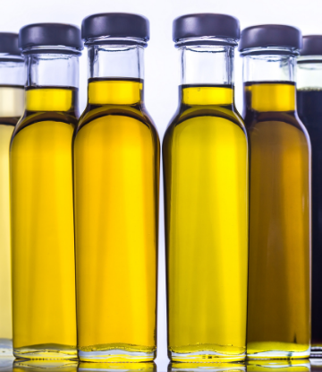 clear bottles of vegetable oil 