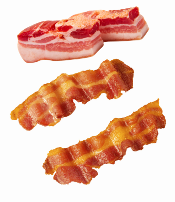 raw pork belly and cooked bacon slices 
