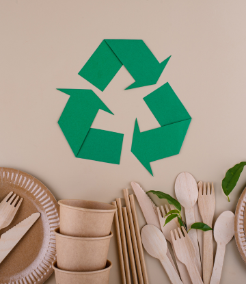 recycling symbol above sustainable packaging 
