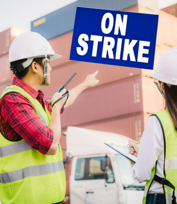 dock workers ppoinint to strike sign 