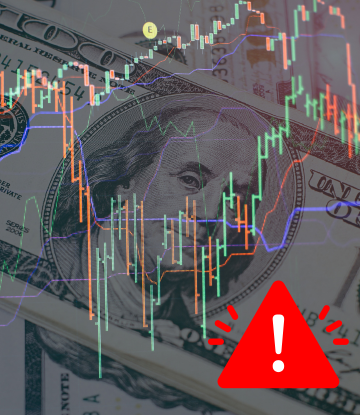 US money with a graph ticker and warning symbol