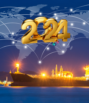 2024 in gold over a large ship on the water 