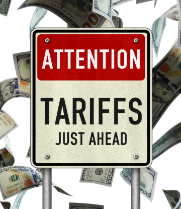 Tariff sign with money behind it 