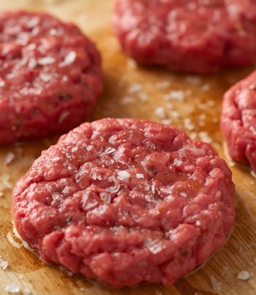 Raw hamburger patties 